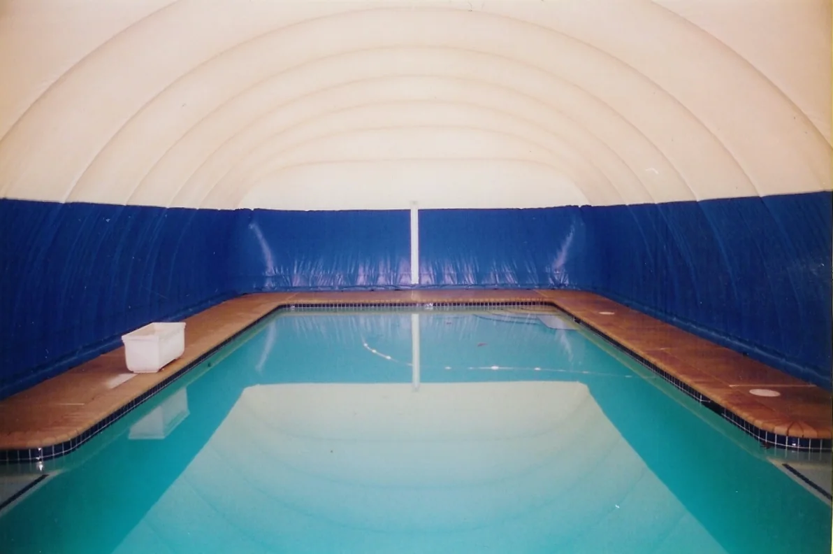 Inside an inflatable pool dome, showing a heated pool ready for winter swimming